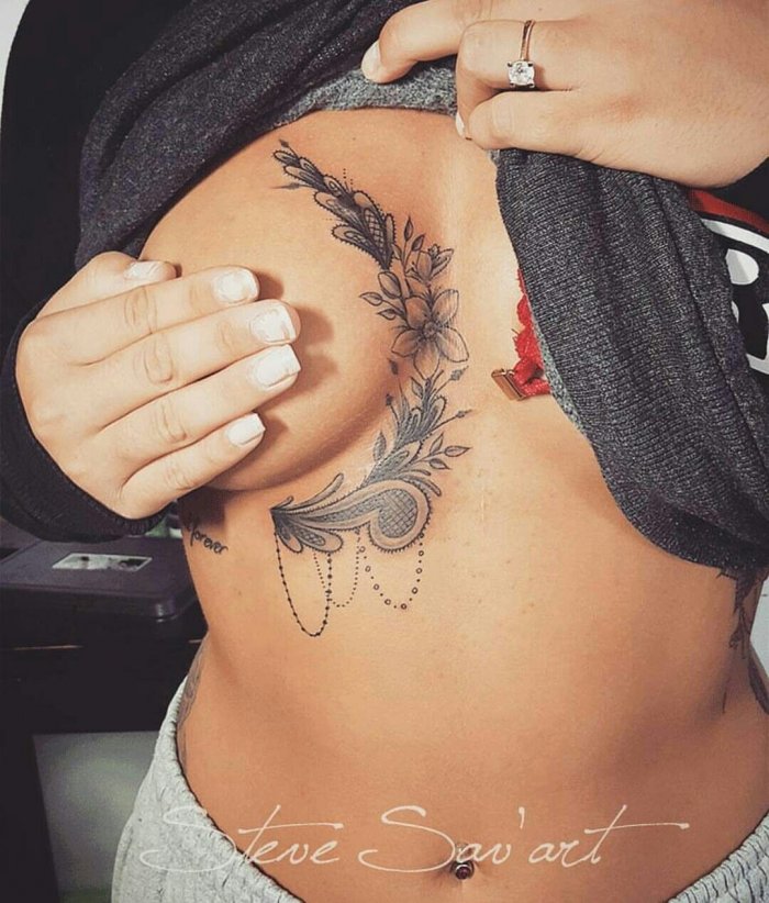 Геометрические тату на ребрах