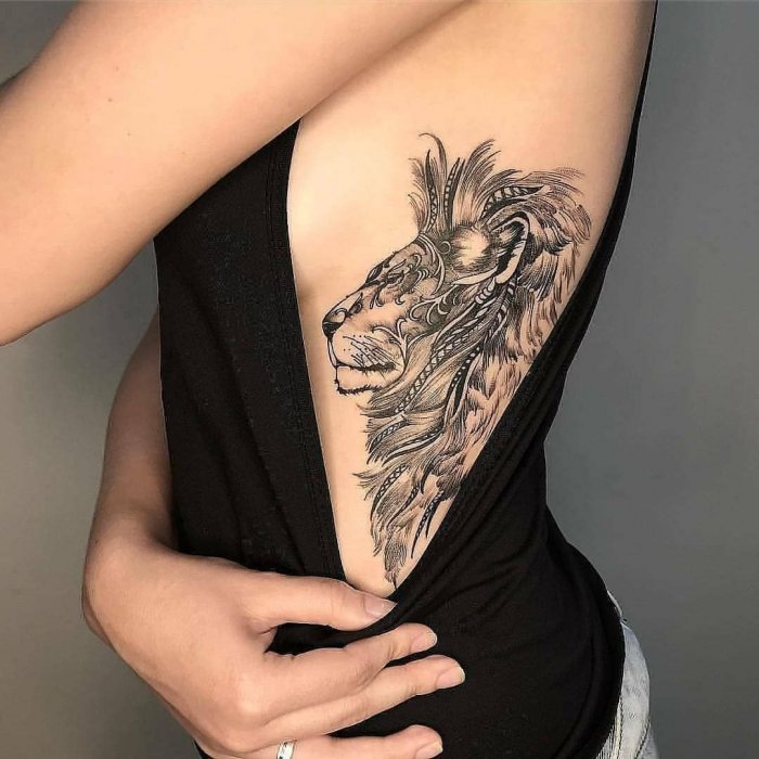 Красивые тату на ребрах у девушек