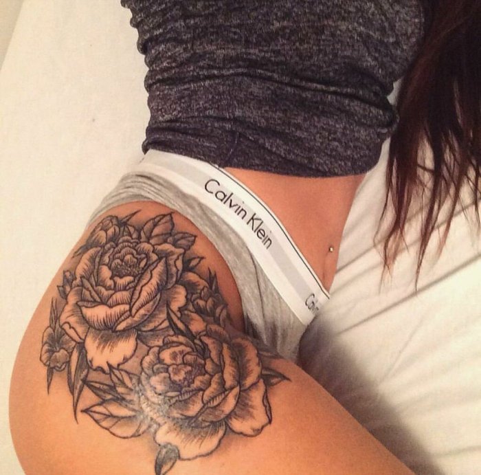 Тату на бедре женские