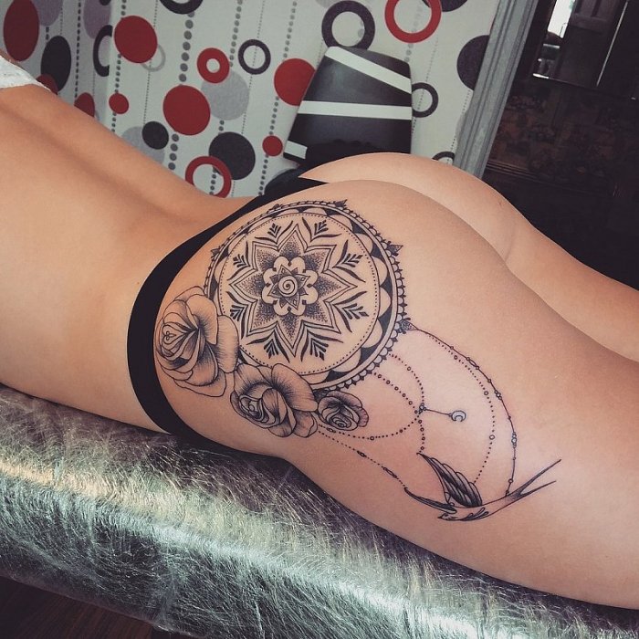 Тату на бедре для девушек