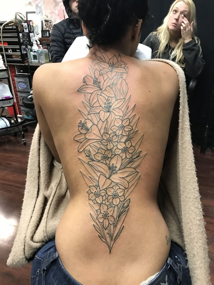 Тату на спине женские