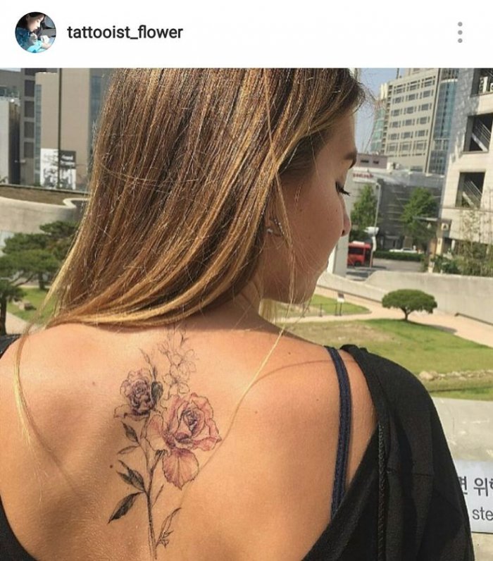 Тату на спине женские