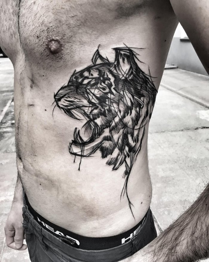 Татуировки для мужчин на ребрах