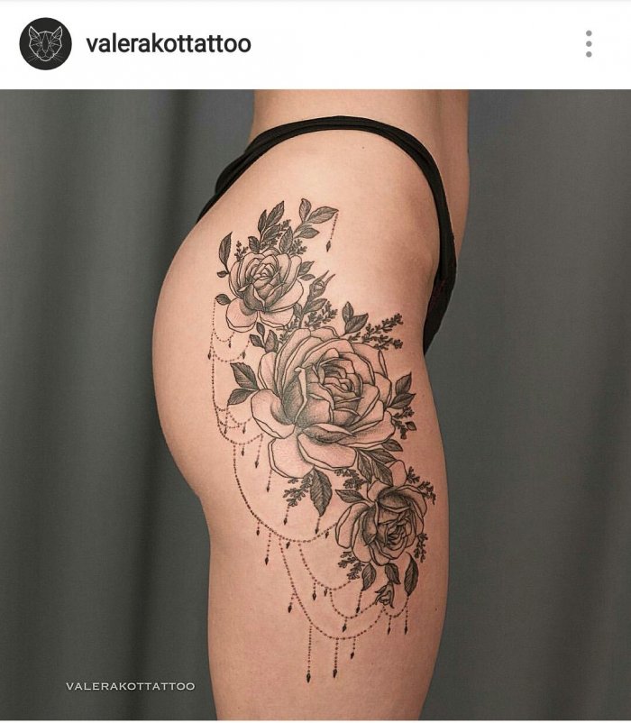 Тату на бедре