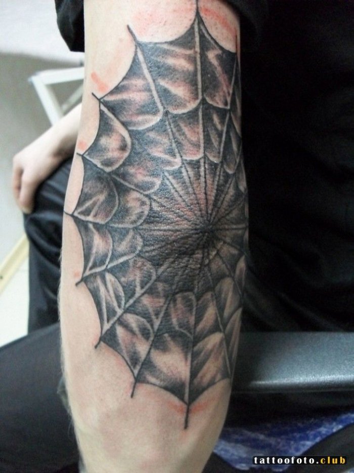 Наколка паутина на локте