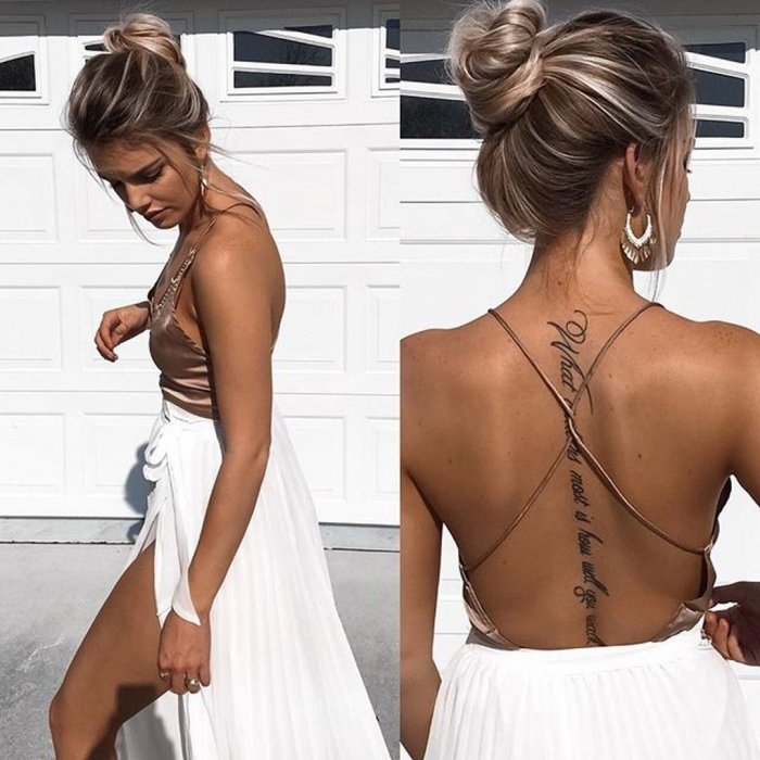 Тату вдоль спины