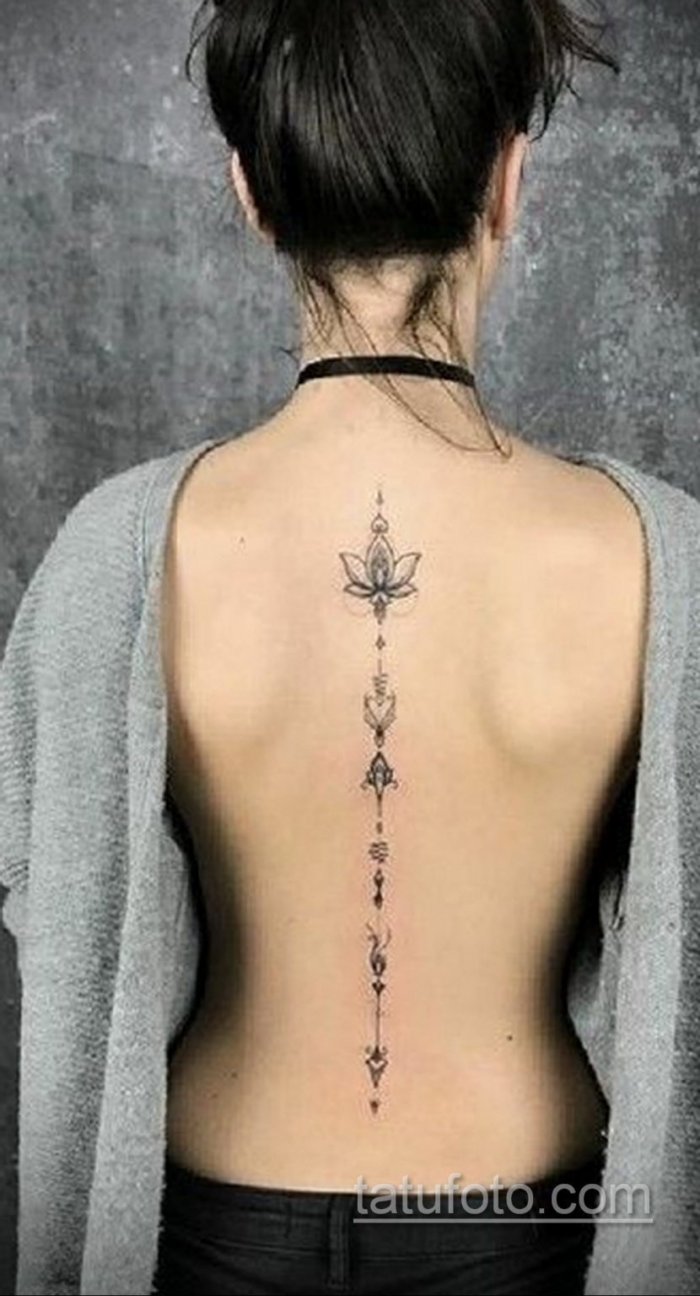 Тата вдоль позвоничника