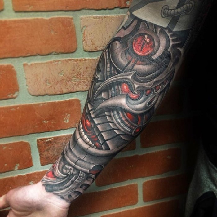 Тату в стиле биомеханика