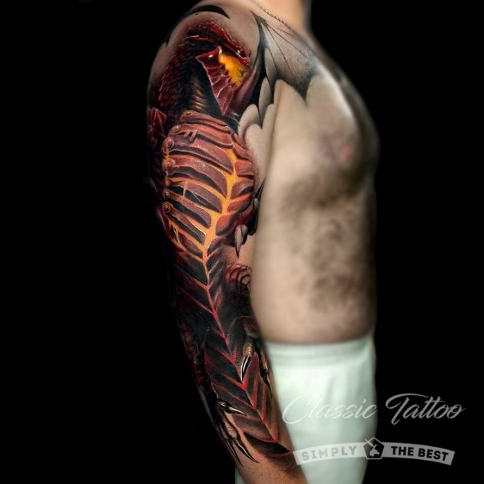 Тату биомеханика на руке мужские