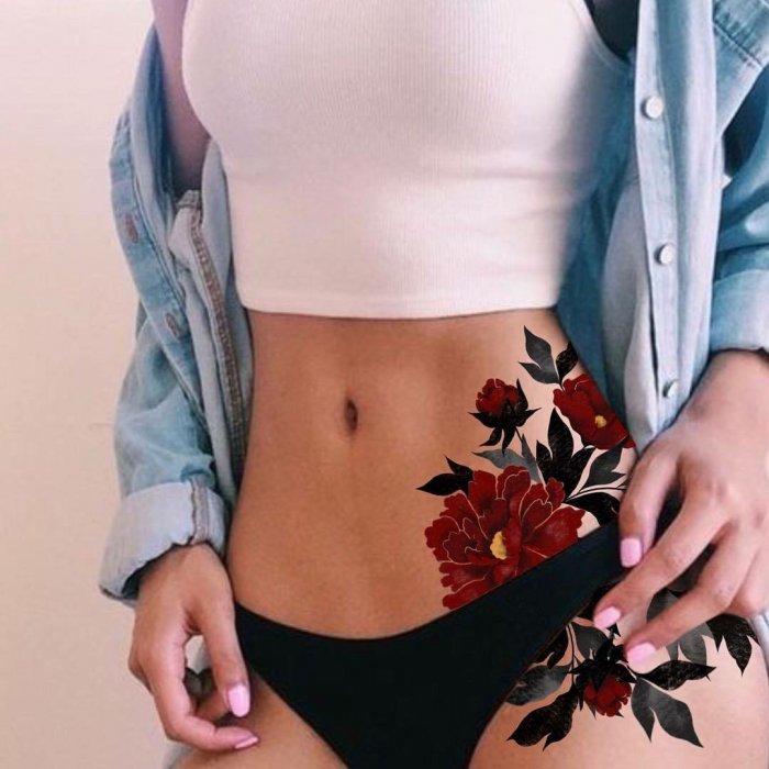 Тату внизу живота