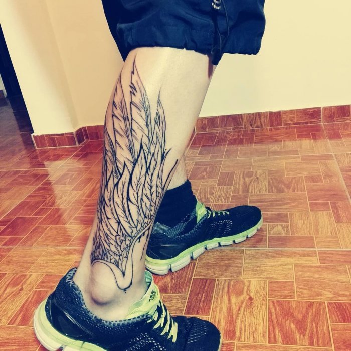 татуировки для мужчин на ноге