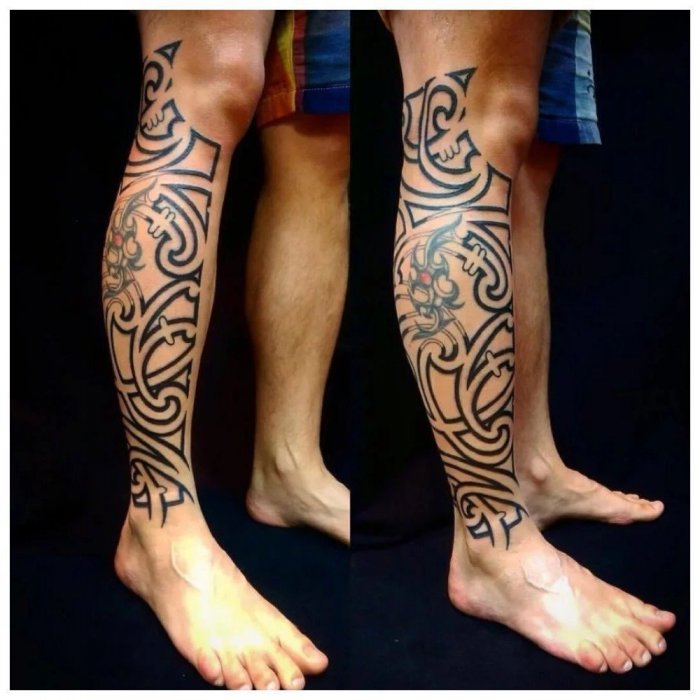 тату полинезия на ноге