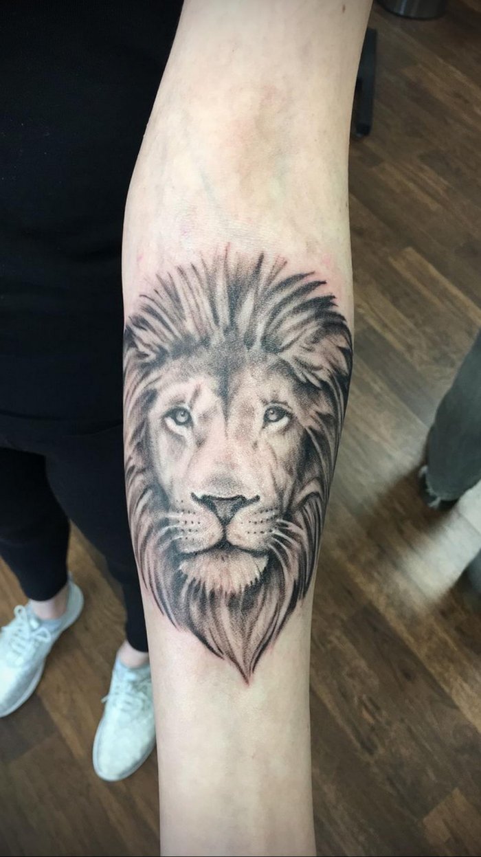 татуировка лев