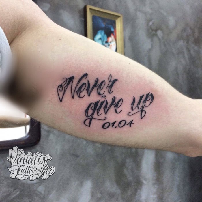 Never give up тату