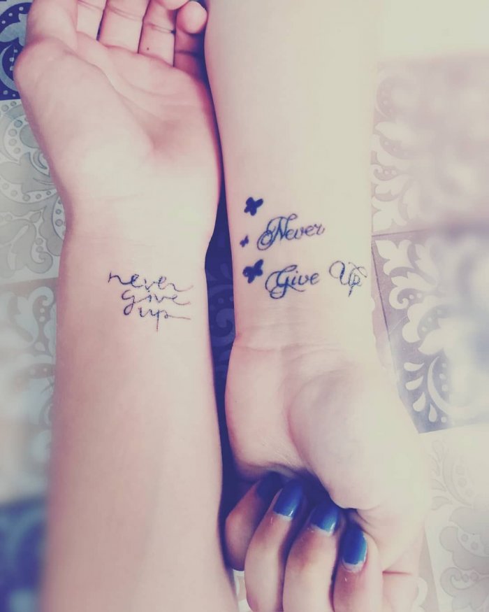 Татуировка never give up