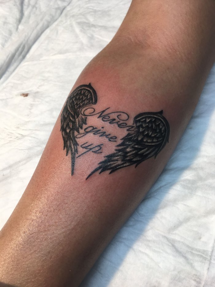 Never give up Tattoo
