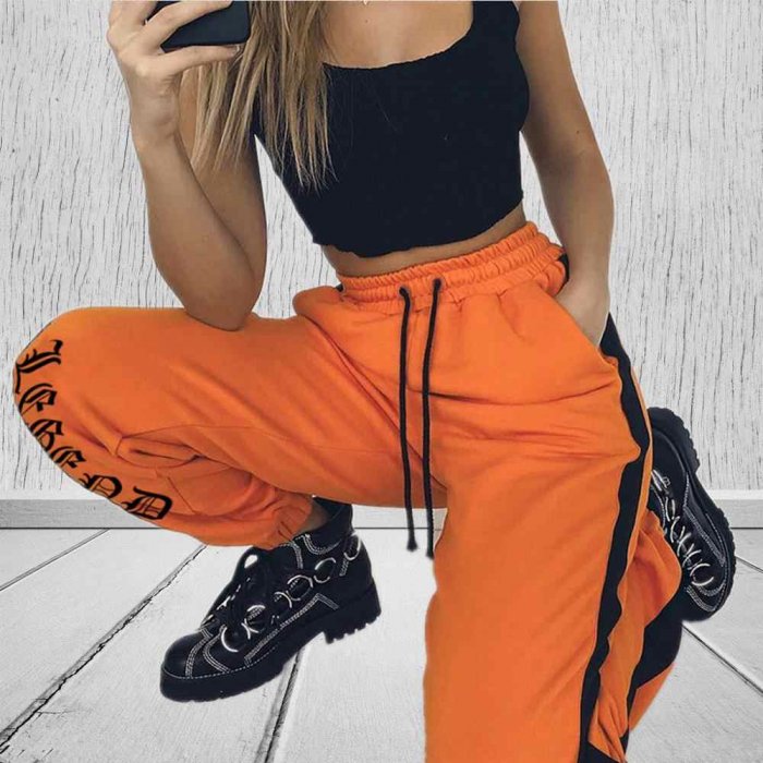 Оранжевые спортивные штаны
